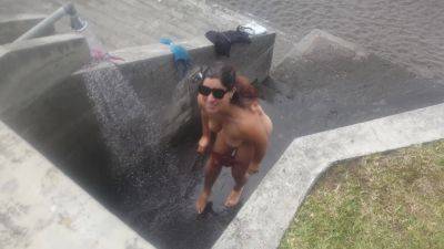 A Curvy Girl Gets Completely Changed And Takes Naked A Shower Outdoors On The Beach - upornia - Spain